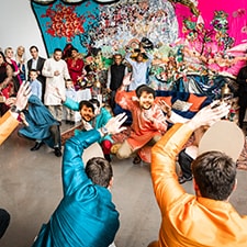 Cardboard bigheads used for a traditional Mehndi party dance.