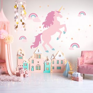 Unicorn wall decal displayed on bedroom wall.