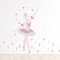 Ballerina wall decal on nursery wall.